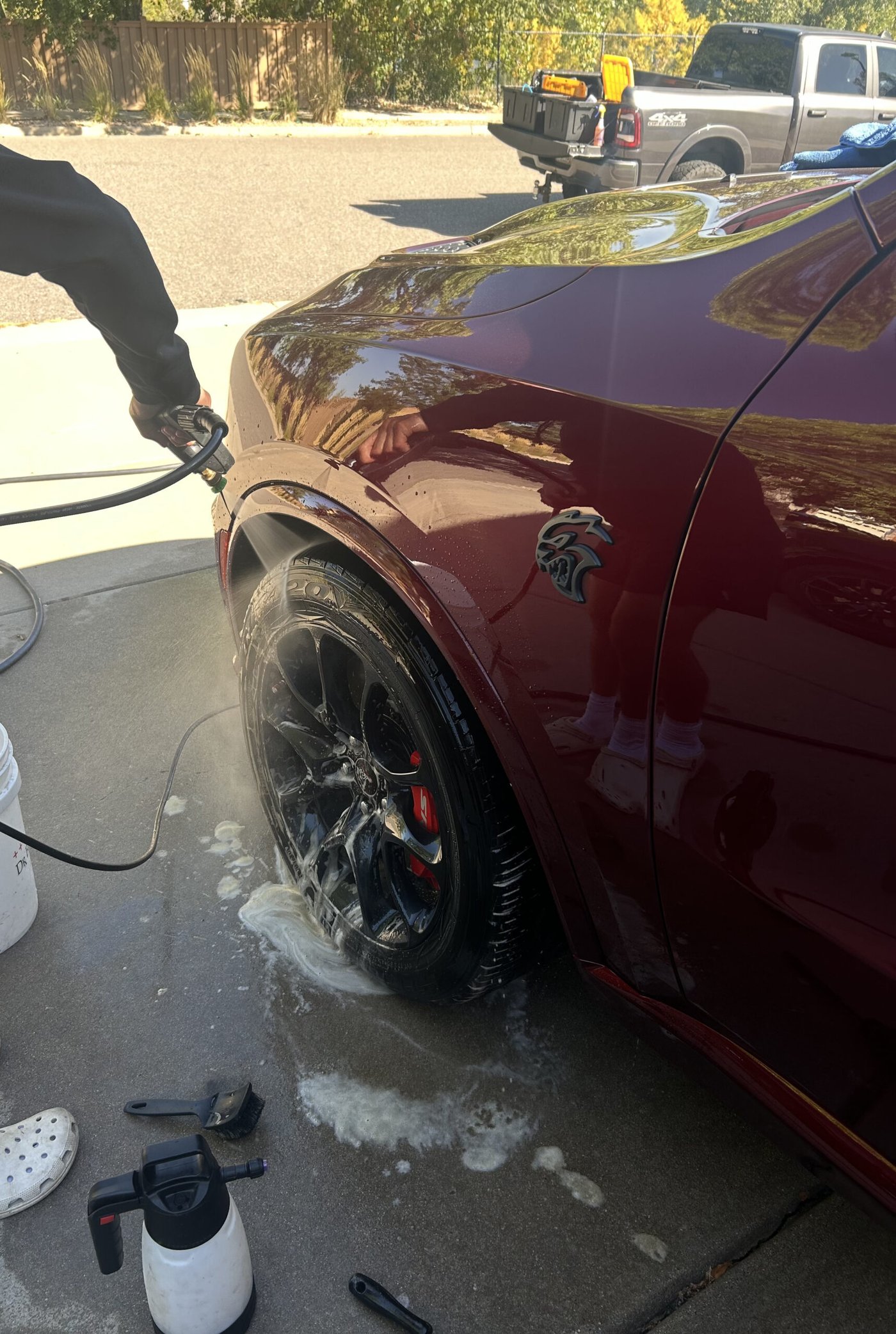 Dodge Charger Hellcat hand washed during a mobile detail during a detail in Oberlin, Ohio