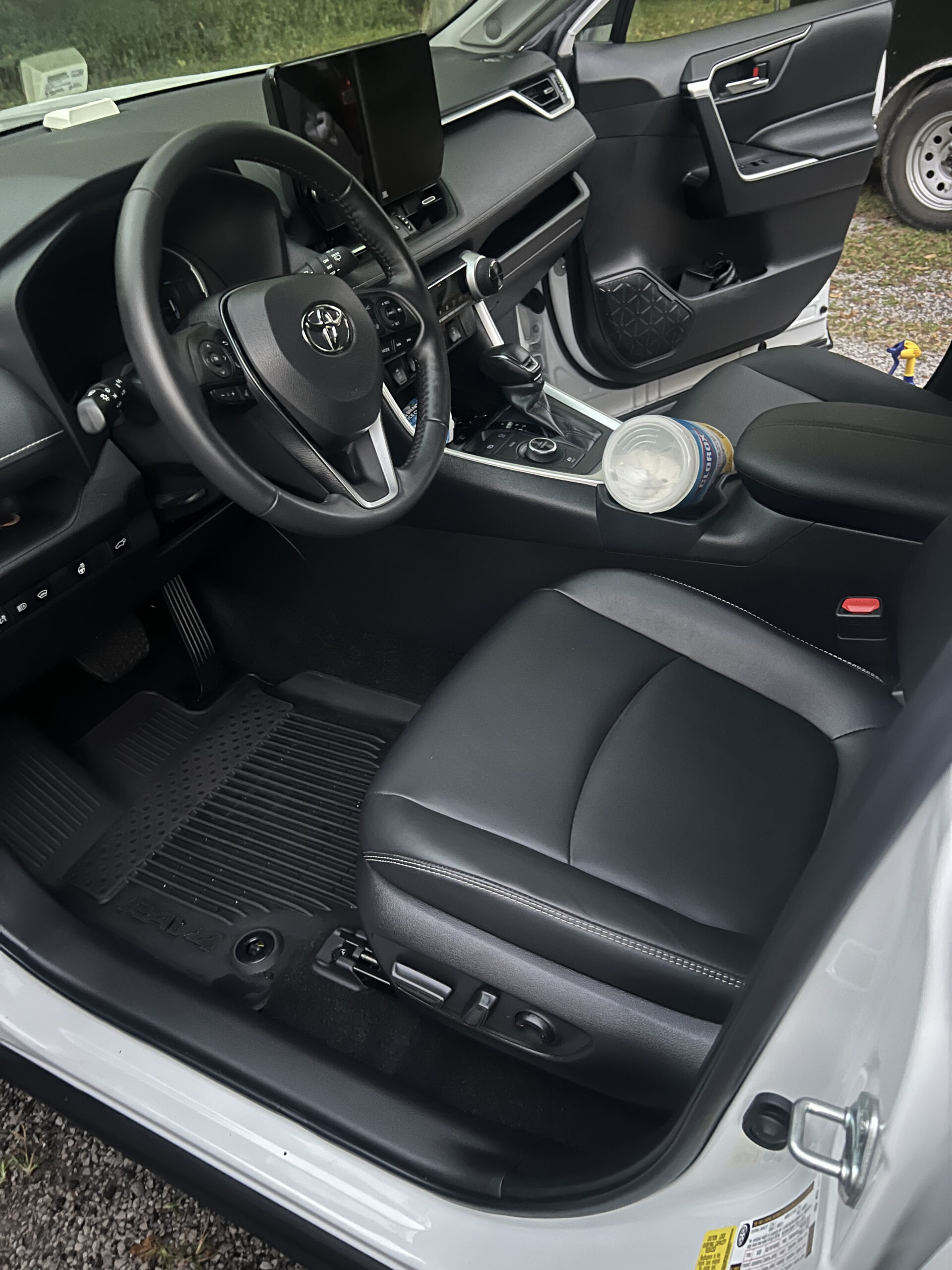 After shot of a Toyota interior with cleaned seats and detailed dashboard